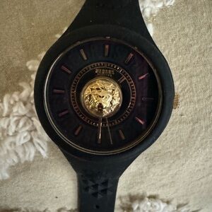 Black Smartwatch with Round Face and Exposed Mechanism